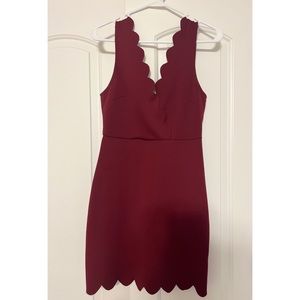 Red dress with scalloped design